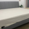 Ecovare stretch-fit bed sheets on a queen bed
